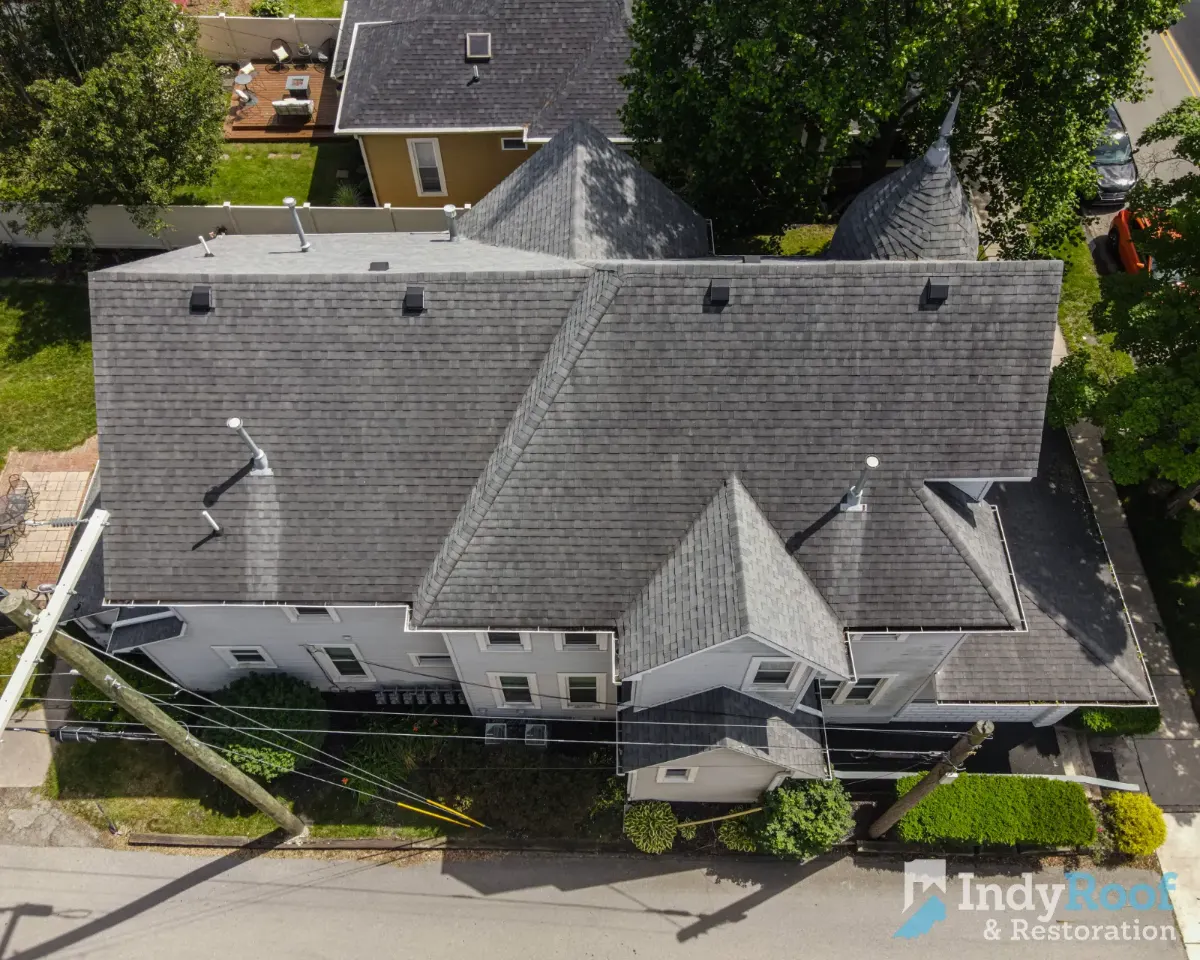 Architectural shingles with ridge vent before restoration in Chatham Hills, Hamilton County